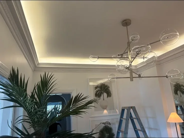 Ceiling fan and integrated ceiling lighting installed in a finished room